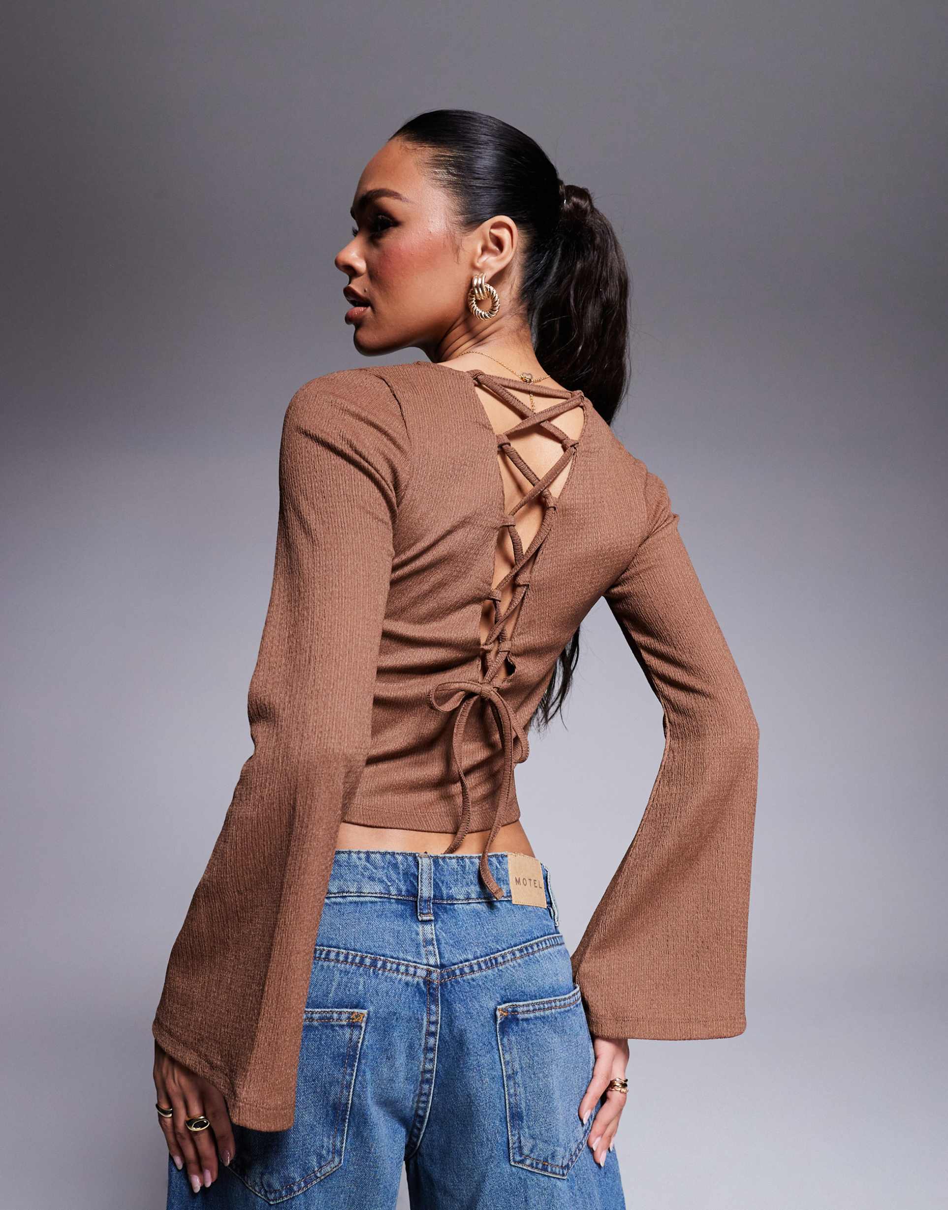 asos design textured lace up back fluted sleeve top in brown