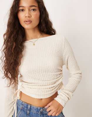 textured long sleeve ruched side top in cream-White