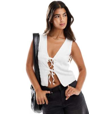 ASOS DESIGN TEXTURED LONGLINE TIE FRONT VEST IN WHITE