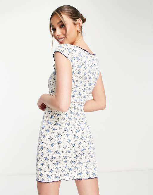 ASOS DESIGN textured mini cap sleeve dress in cream ditsy floral