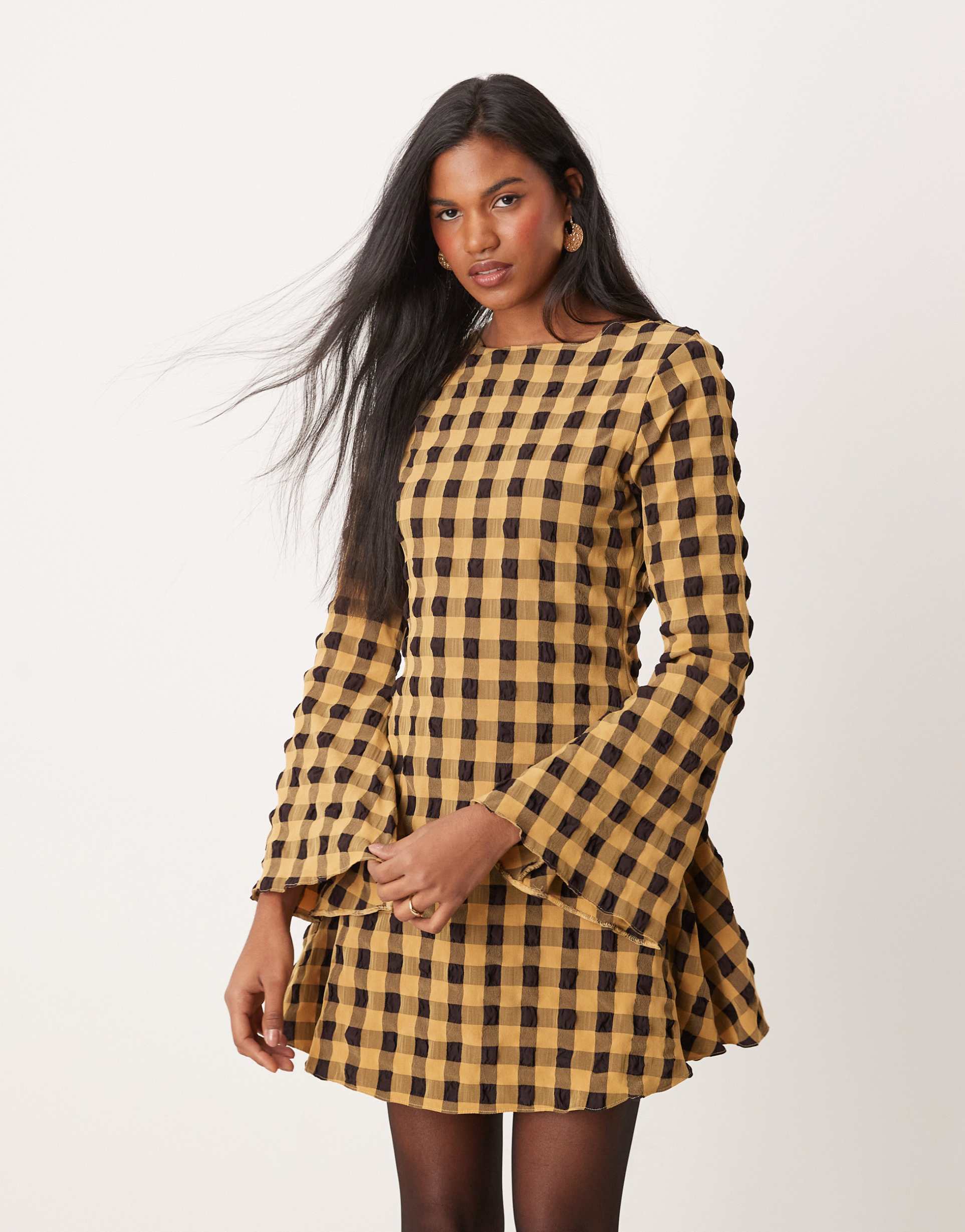 asos design textured mini dress with fluted sleeve in black and yellow check