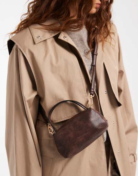 ASOS DESIGN textured mini grab clutch with cross-body strap in chocolate - view 1