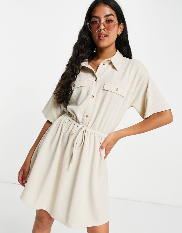 ASOS DESIGN textured mini shirt dress with horn buttons in cream