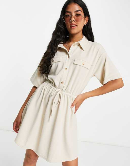 ASOS DESIGN textured mini shirt dress with horn buttons in cream | ASOS