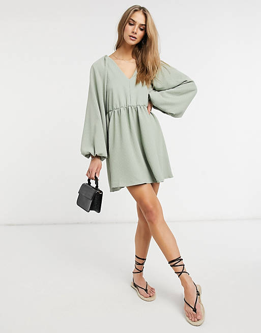  textured mini smock dress with volume sleeves in sage green 