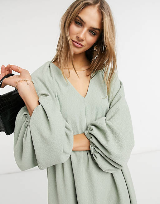  textured mini smock dress with volume sleeves in sage green 