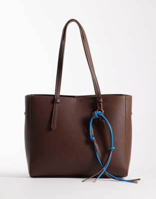 ASOS DESIGN textured multi compartment tote with detachable bag charm in chocola