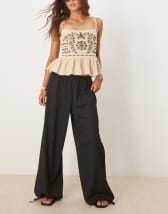 Armani Exchange sheer wide leg pants in black | ASOS