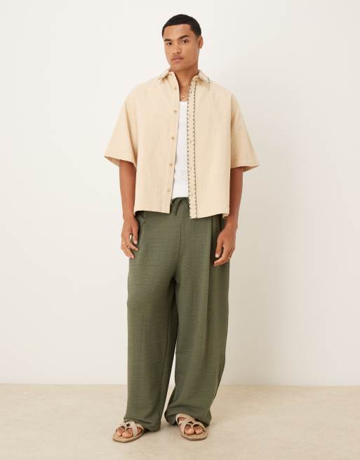 ASOS DESIGN textured oversized shirt with whip stitch detailing in stone