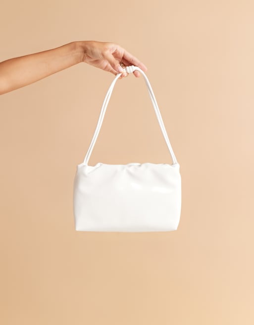 ASOS DESIGN textured patent cloud knot handle shoulder bag