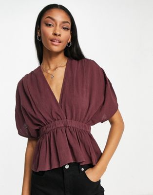 ASOS DESIGN textured plunge front top with elastic waist detail in chocolate