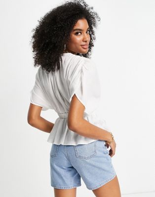 ASOS DESIGN textured plunge front top with elastic waist detail in white
