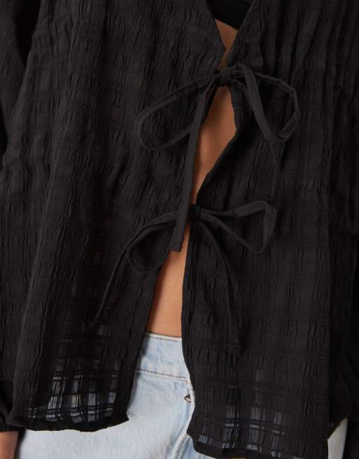 ASOS DESIGN textured plunge tie detail blouse