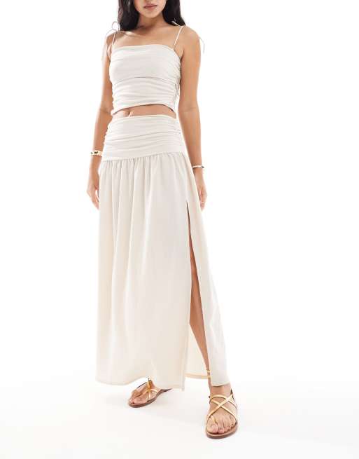 ASOS DESIGN textured ruched side drop waist maxi skirt with slit front in stone - part of a set, 2 of 5