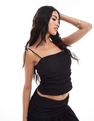 asos design textured ruched side tie shoulder cami top in black - part of a set