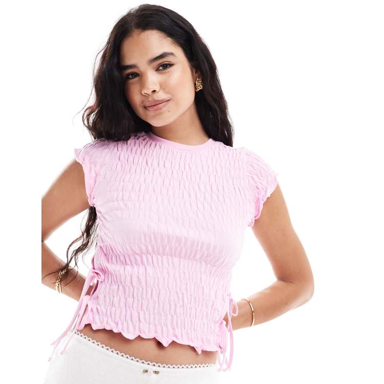 ASOS DESIGN textured short sleeve top with tie sides in pink