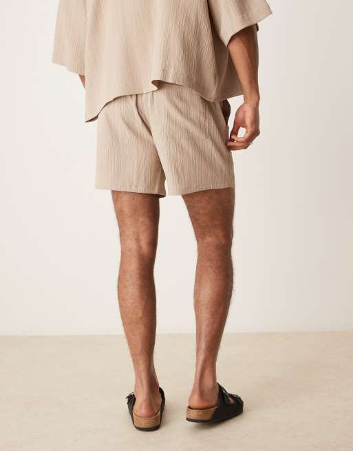 ASOS DESIGN textured shorts in short length in beige - part of a set