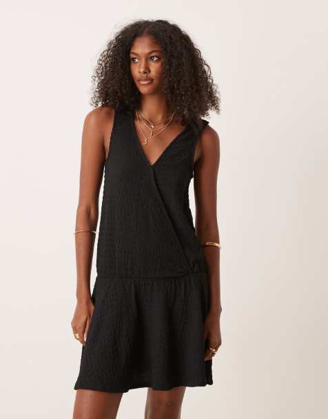 ASOS DESIGN textured sleeveless V front wrap with drop waist mini dress in black - view 1