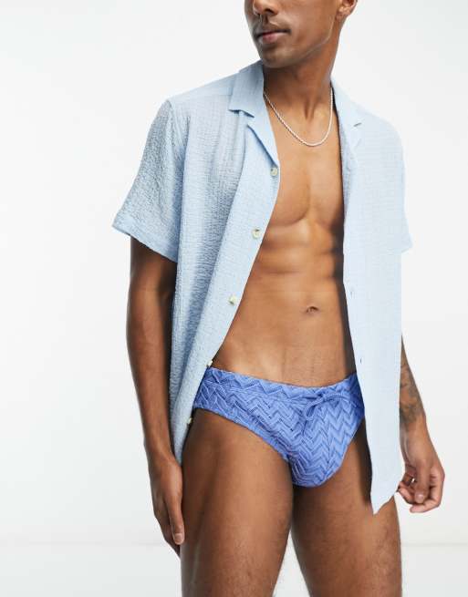 ASOS DESIGN swim briefs with contrast white tipping in blue