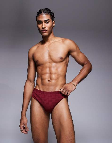 ASOS DESIGN textured swim briefs in burgundy - view 1