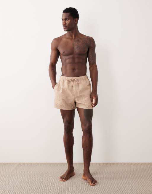 ASOS DESIGN textured swim shorts in short length in beige, 2 of 5