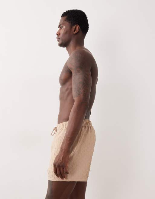ASOS DESIGN textured swim shorts in short length in beige, 3 of 5