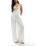 [ASOS DESIGN] ASOS DESIGN textured tassel tie waist wide leg pants in white 6 White