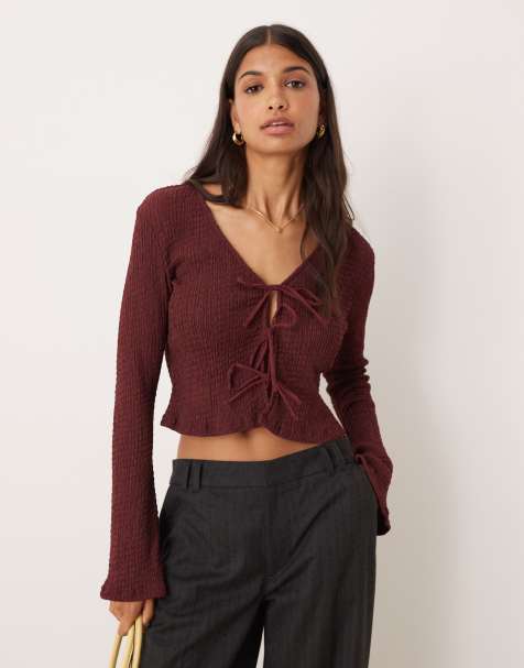 ASOS DESIGN textured tie front long sleeve top in burgundy - view 1
