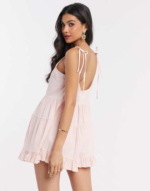 ASOS DESIGN textured trapeze tiered playsuit in blush ASOS - Main Image