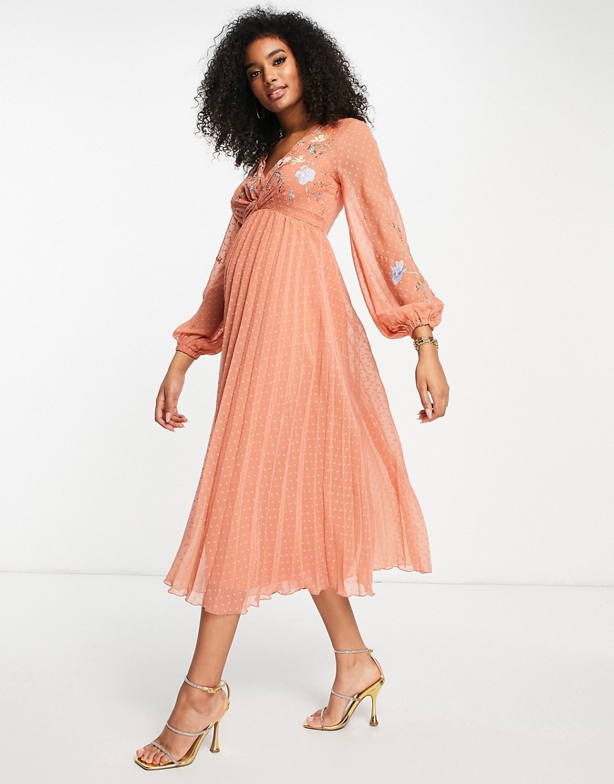 ASOS DESIGN textured twist front pleated midi dress with all over embroidery in rust-Orange