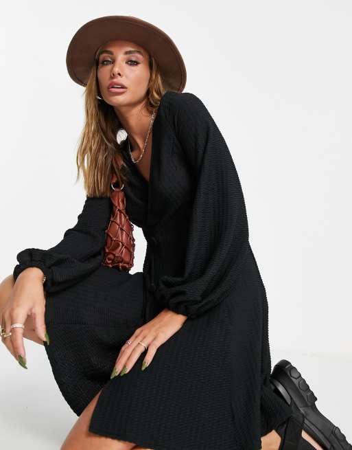 ASOS DESIGN textured v neck long sleeve mini dress with buttons in black 