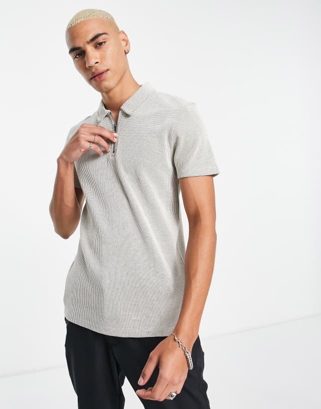 ASOS DESIGN textured waffle polo with zip detail in beige