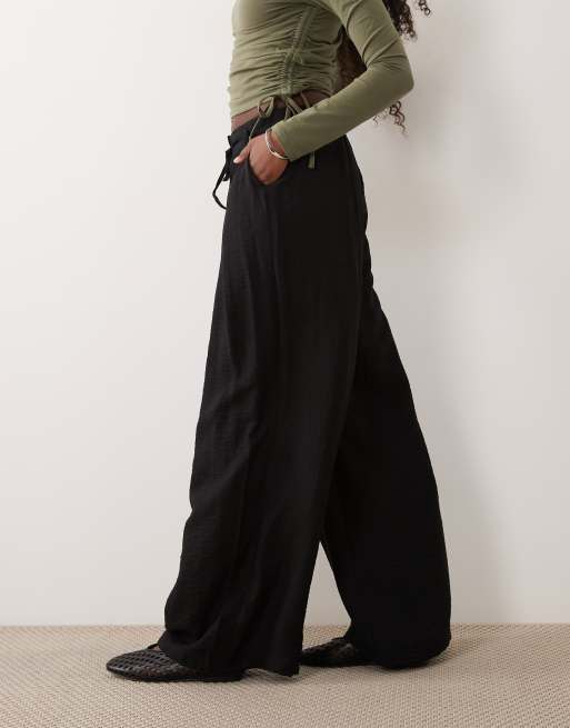 ASOS DESIGN textured wide leg pants with tie waist in black, 3 of 5