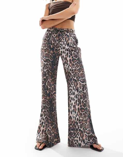 ASOS DESIGN textured wide leg trousers in animal print - view 1