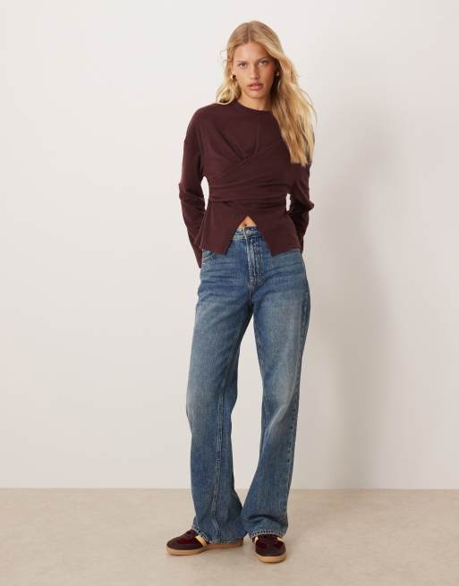 ASOS DESIGN textured wrap detail long sleeve top in burgundy
