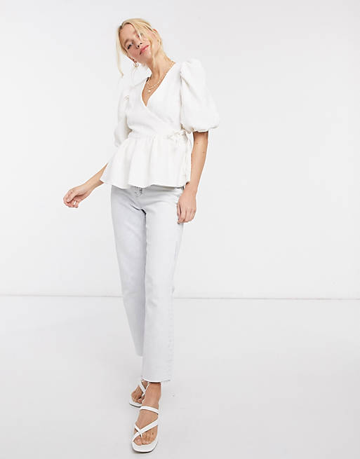 Tops Shirts & Blouses/textured wrap top with volume sleeve in cream 