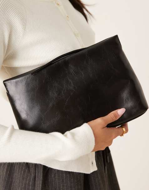 ASOS DESIGN textured zip top clutch bag in black - view 1