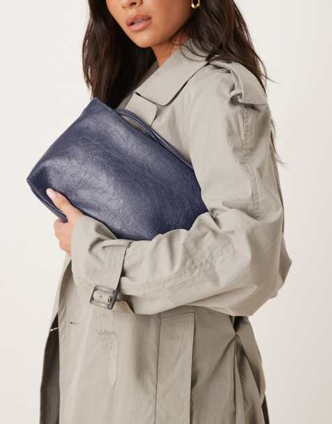 ASOS DESIGN textured zip-top clutch bag in navy - view 1