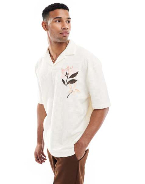 ASOS DESIGN – Texturiertes Oversize-Poloshirt mit Knopfleiste und Stickerei - view 1