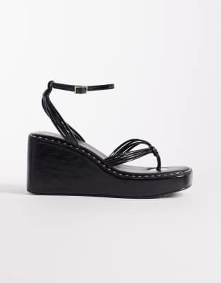 ASOS DESIGN Thalia barely there toe thong wedges in black