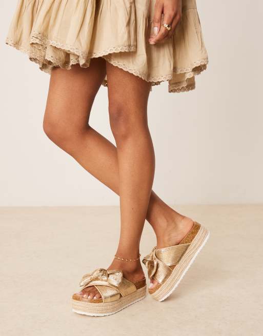 ASOS DESIGN Thankful bow detail flatform sandals in gold