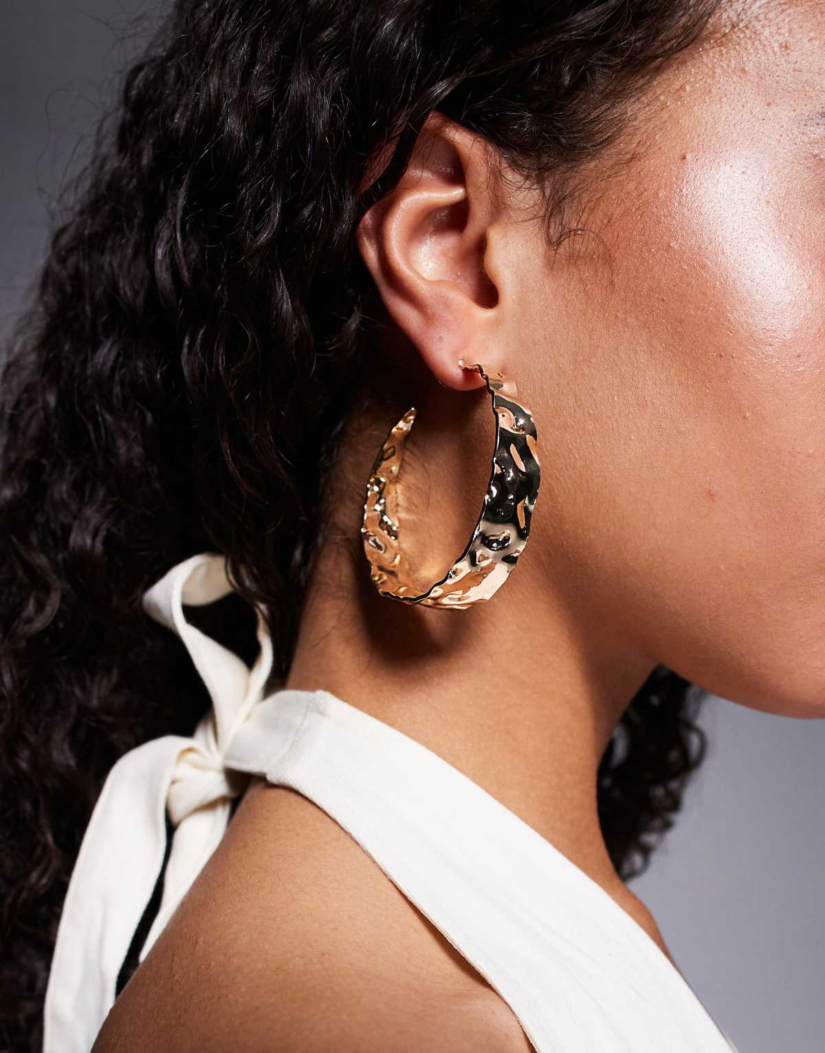 ASOS DESIGN thick hoop earrings with bashed finish in gold tone