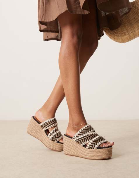 ASOS DESIGN – Thistle – Mules in Natur und Schwarz mit Überwendlingsstich und Keilabsatz - view 1