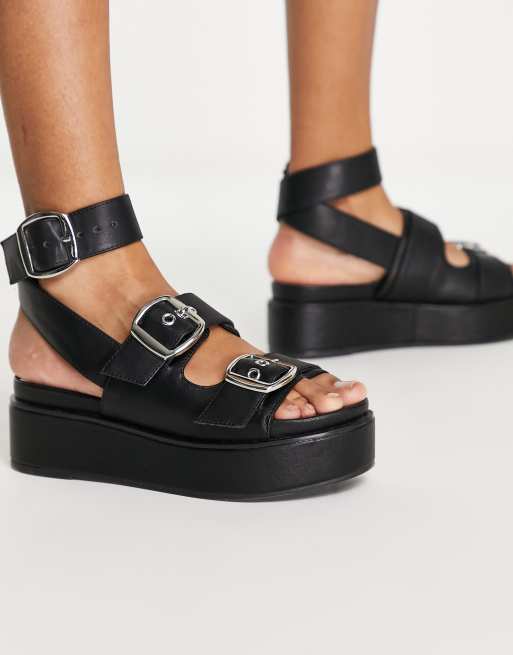 ASOS DESIGN - Thistle - Sandalen met dikke plateauzool en gespen in zwart 