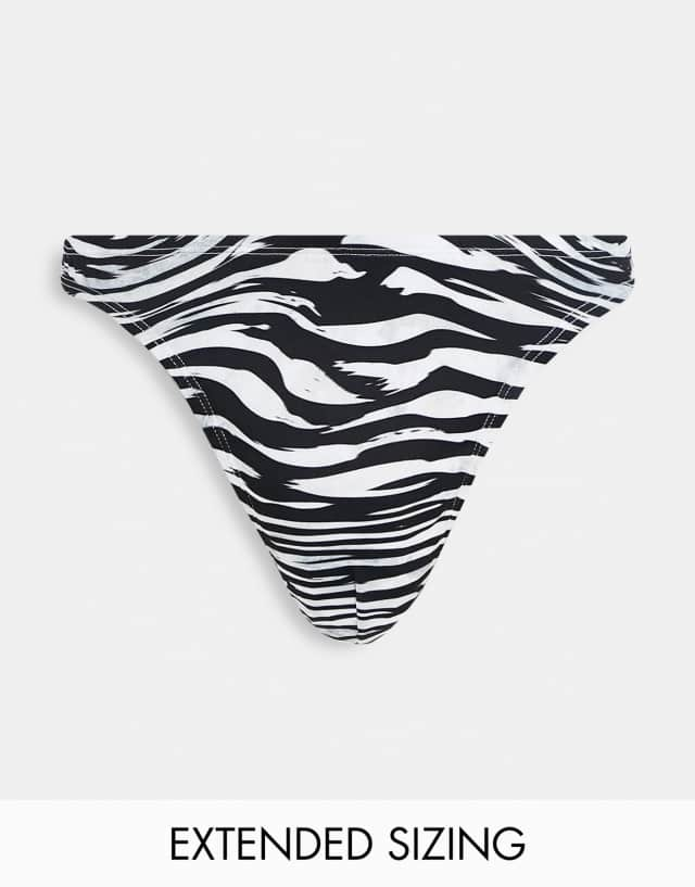 ASOS DESIGN thong in slinky fabric in zebra print