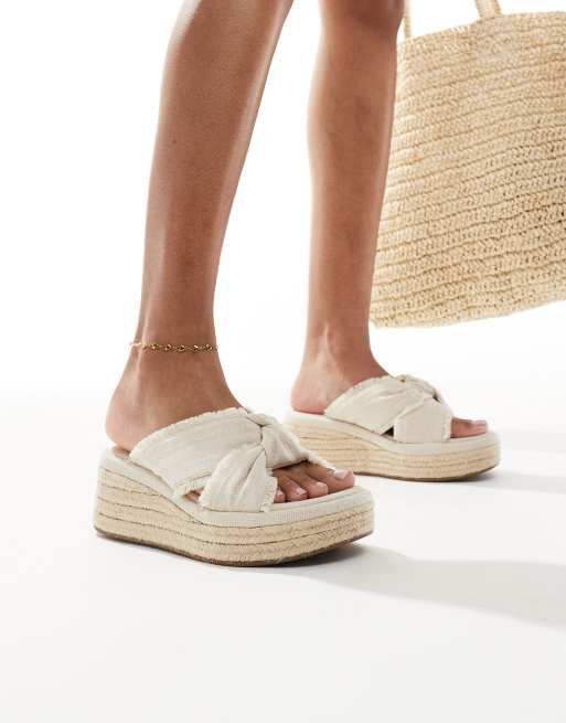 ASOS DESIGN Thoughtful knot detail flatform mules in natural