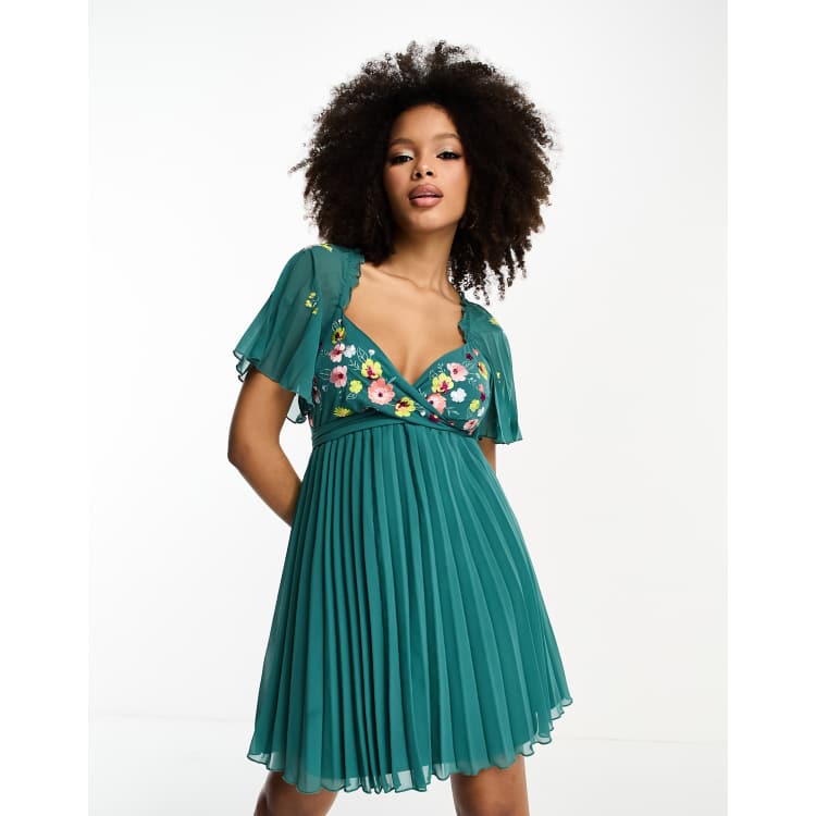 ASOS DESIGN tie back angel sleeve pleated mini dress with embroidered bust  in teal