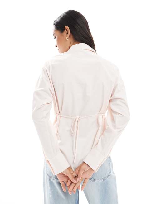 ASOS DESIGN tie back shirt with shoulder pads in pink