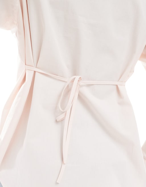 ASOS DESIGN tie back shirt with shoulder pads in pink