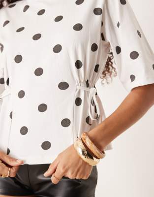 ASOS DESIGN tie detail t-shirt in polka dot
